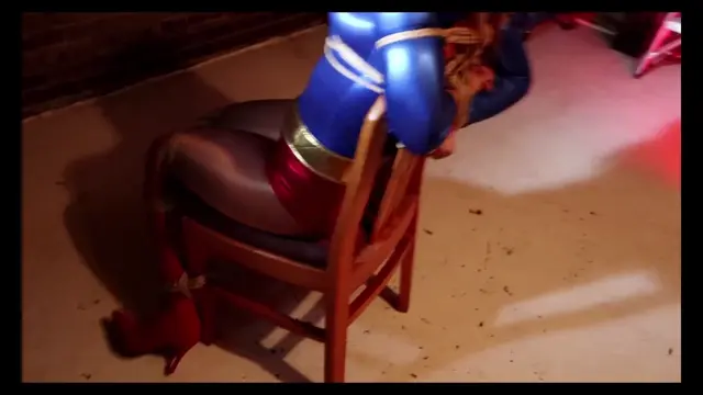 Poster: Mr Big is Ultra Girl bound and gagged in his lair