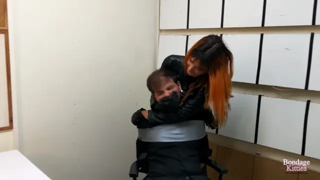 Poster: Police Officer Tied Up and Hand In Mouth By Sexy Criminal